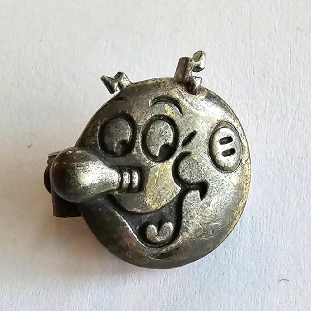 Vintage Reddy Kilowatt clip pin dark silver tone killowatt
